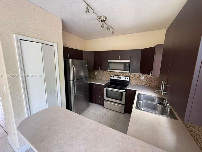 Building Photo - 6990 NW 177th St