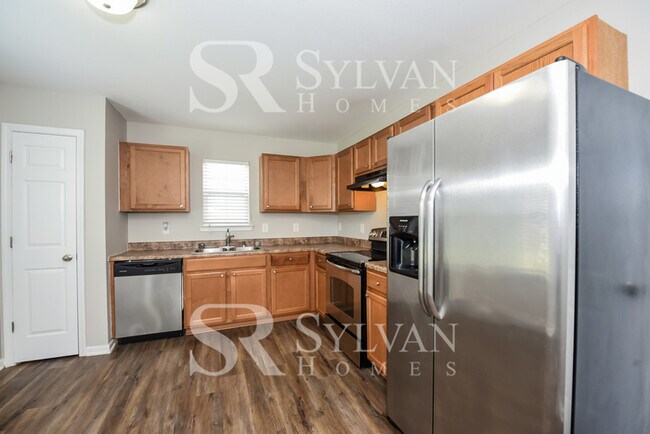 Building Photo - Spacious 4BR 2.5BA Home