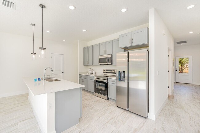 Building Photo - BRAND NEW! 4/2 PALM BAY!