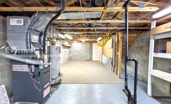 Building Photo - Spacious Condo with Modern Amenities and Garage Parking