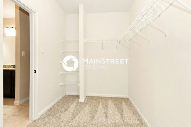 Building Photo - 4 Bedroom Pet-Friendly Home in Conroe, TX with Main Street Renewal
