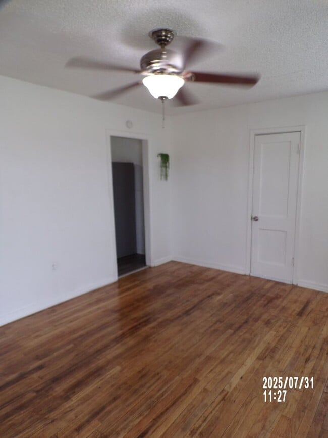 Building Photo - NEW listing-refinished hardwood floors, new laminate and paint throughout