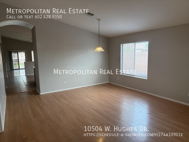 Building Photo - 10504 W Hughes Dr