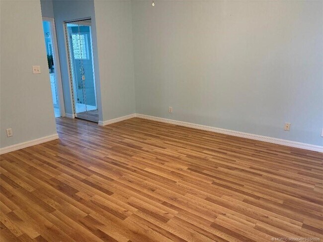 Building Photo - 3486 SW Pindo Palm Ln