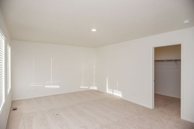 Building Photo - Spacious 4-Bedroom Home with 3-Car Garage & Walk-Out Basement | Prime Living Opportunity
