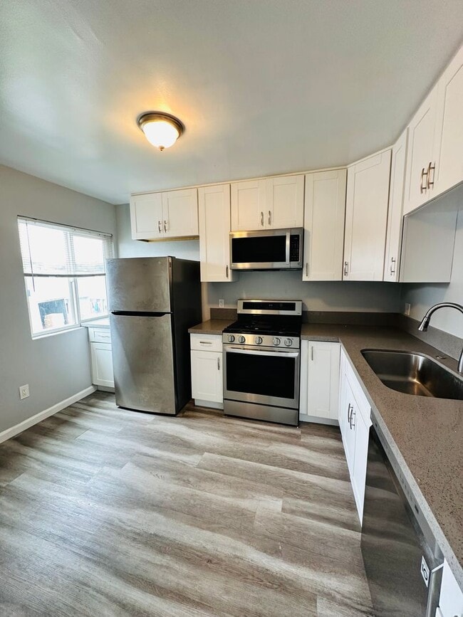 Building Photo - Bright and Updated 2-Bedroom Apartment – Second Floor **Move in today & get ONE MONTH FREE!**