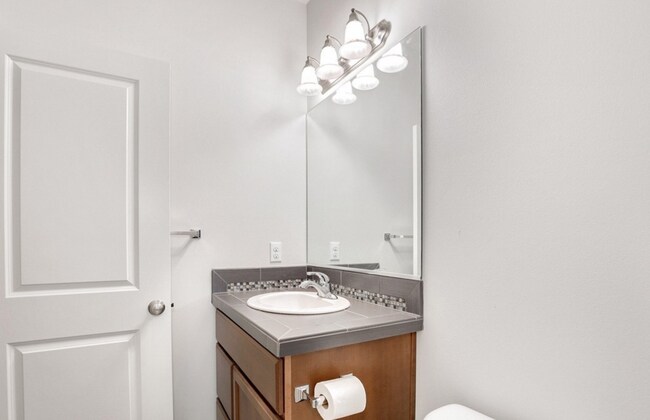Building Photo - A spacious 4-bedroom and 3.5 bathroom home...