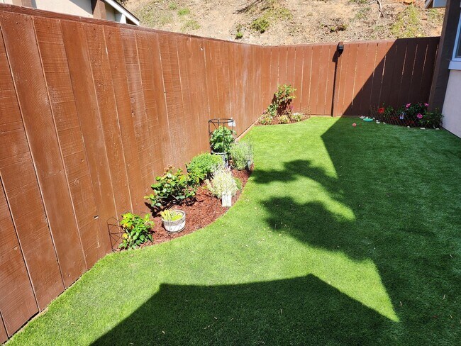 Building Photo - Coming in June......Sunny & Spacious 3BR Condo – Minutes from the Beach