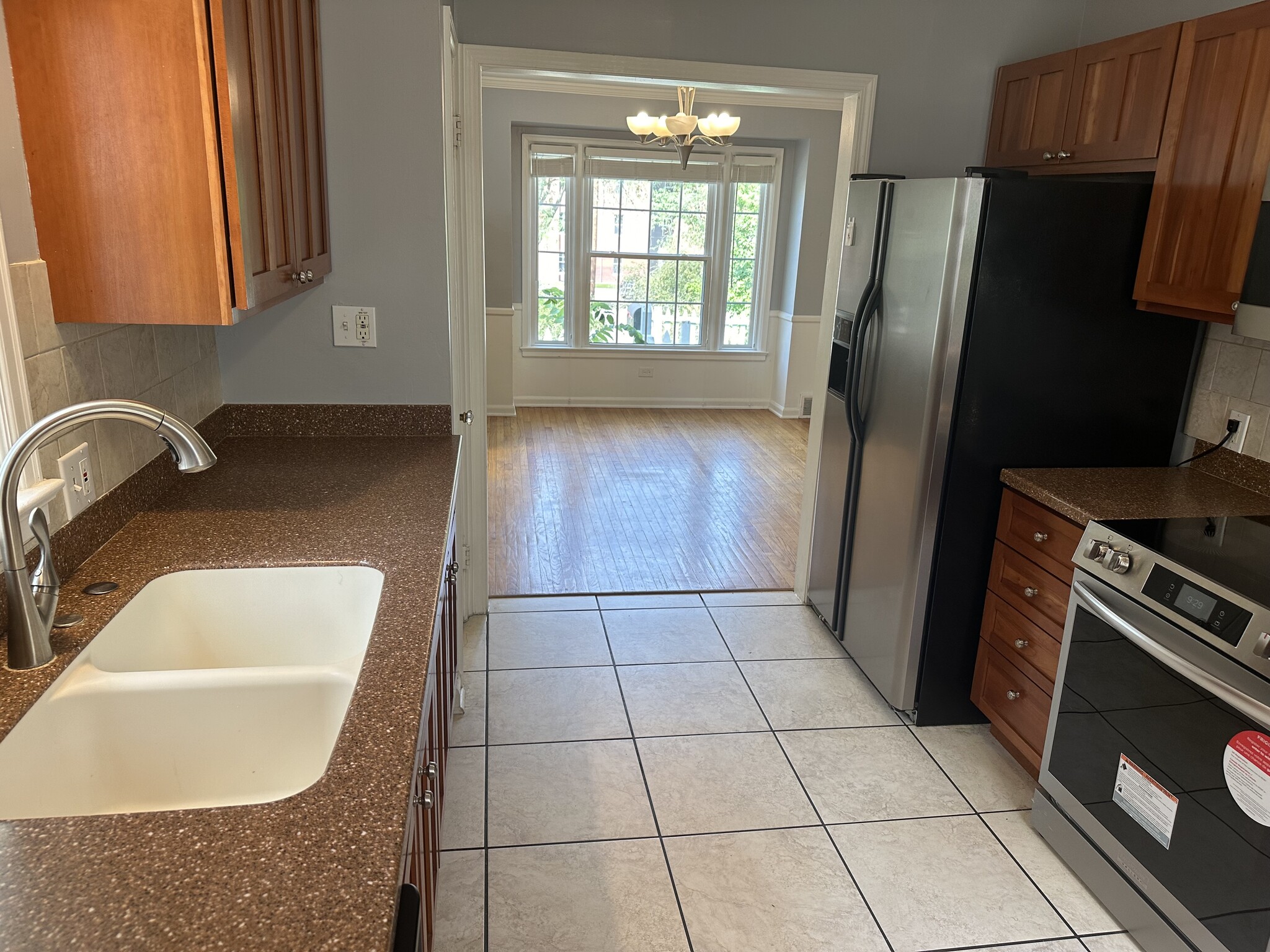 Kitchen connected to dining room. - 5101 Boulevard Pl