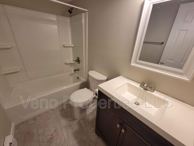 Building Photo - 9/11/13 Village Dr.