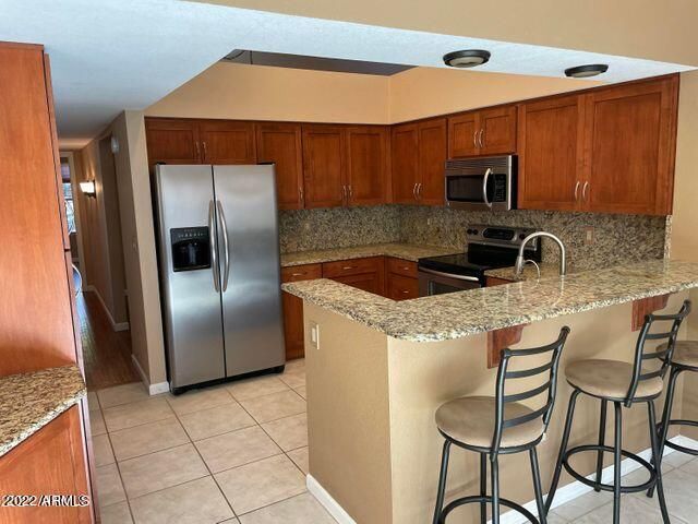 Building Photo - 11021 E Poinsettia Dr