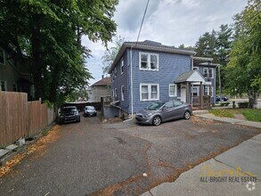 Building Photo - Large Duplex - Off-Street Parking - Centra...