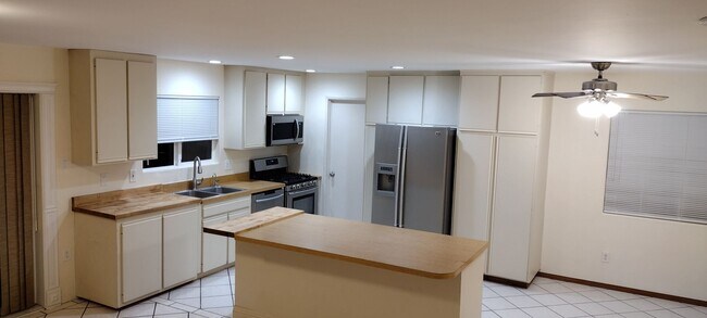 Building Photo - House with Separate studio apartment Included