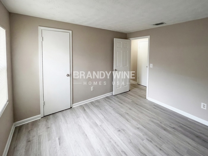 Building Photo - 8409 Red Holly Ln