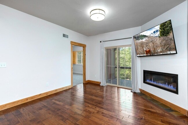 Building Photo - Unfurnished Condo Retreat with Modern Comf...