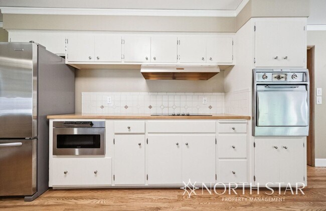 Building Photo - Charming Home in Coveted First Addition Ne...