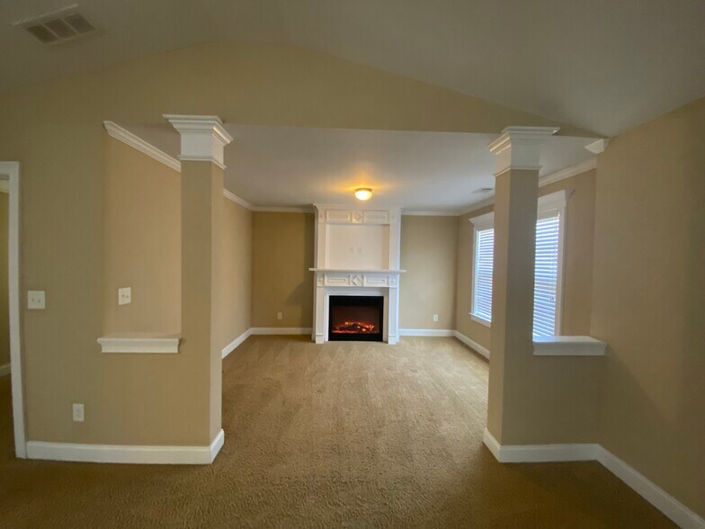 Master Bedroom Sitting Area With Fireplace - 319 Haywood Dr