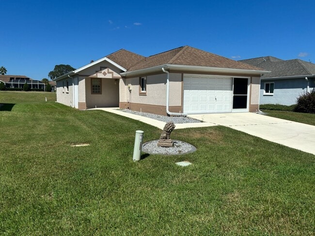 Building Photo - Ocala Palms - Welcome Home - In a age restricted 55+, golf course community