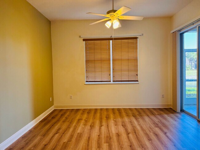 Building Photo - Experience Bell Tower Park. GATED ground floor 2 Bed 2 Bath Den 1 Car Garage Condo.