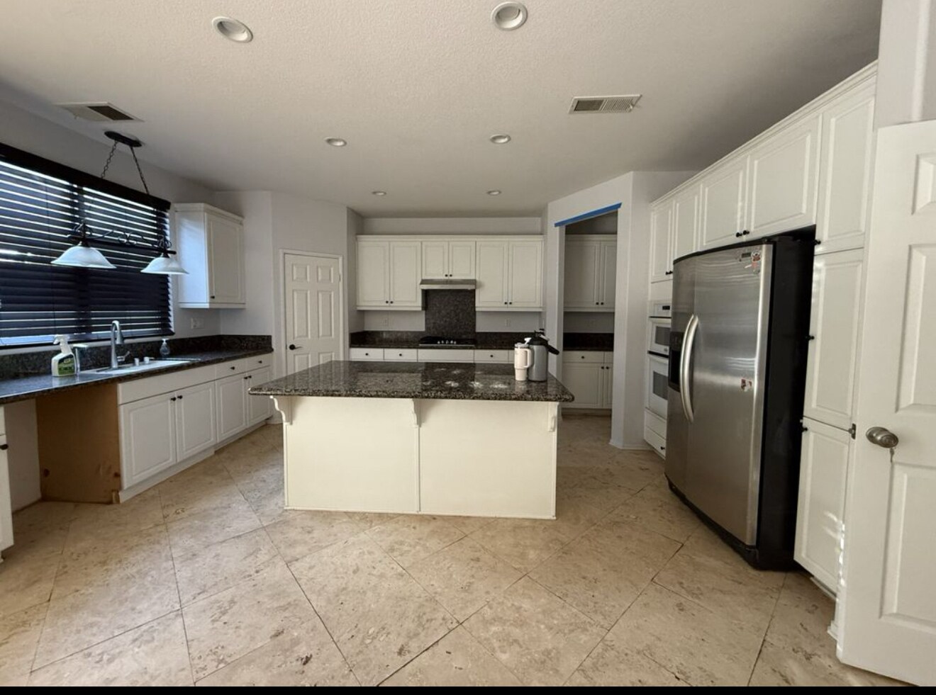 Kitchen with lots of cabinets - 6923 Delaware River Dr