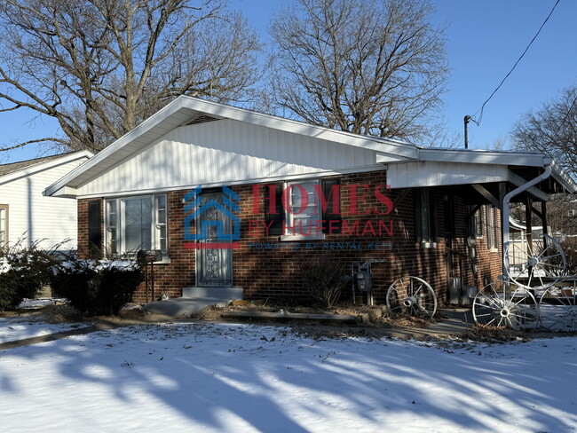 Primary Photo - Three Bedroom House | Carport