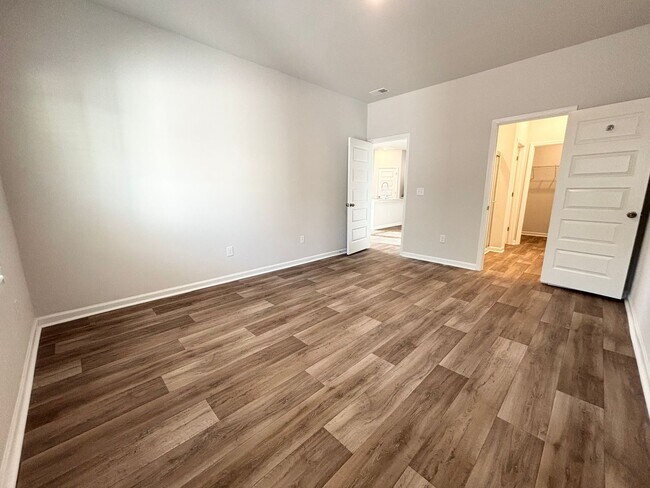 Building Photo - ABSOLUTELY BEAUTIFUL BRAND-NEW BUILD TOWNHOME