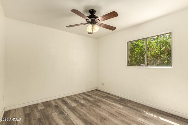 Building Photo - 3316 N 63rd Ave