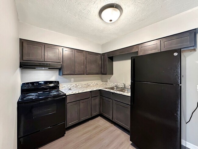 Building Photo - Cozy & Affordable 2-Bedroom Apartment at The Oaks on Davidson – Greensburg, IN