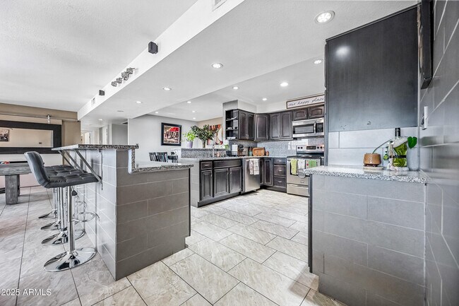 Building Photo - 7940 E Camelback Rd