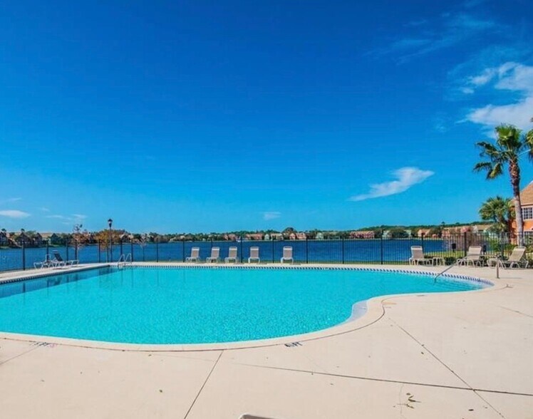 Building Photo - 9586 Lake Chase Island Way