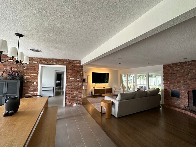 Open concept living area with fireplace - 511 Lake Shore Dr