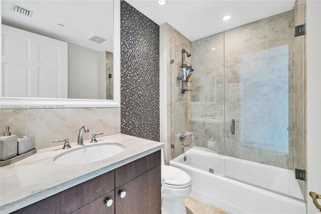 Building Photo - 10295 Collins Ave