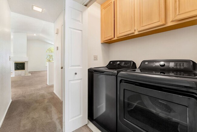 Building Photo - Vaulted Ceilings, Cozy Fireplace & Desirable Single-Story Living Near The Lakes!