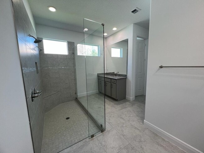 Building Photo - This Charming Brand-New Home is a 4/3 with...