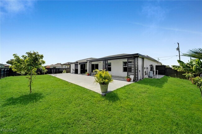 Building Photo - 3095 NW 4th Pl