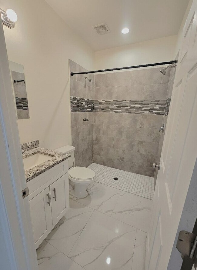 Building Photo - Brand-New Modern 2BR/1BA Home – Desirable Lehigh Location