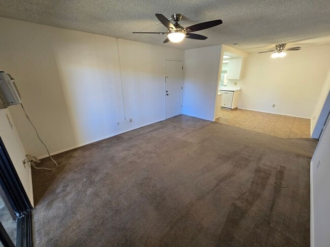 Building Photo - Move-In Special: 1/2 off 1st Month's Rent!!!  Freshly Painted 1-Bedroom Condo with Covered Parking