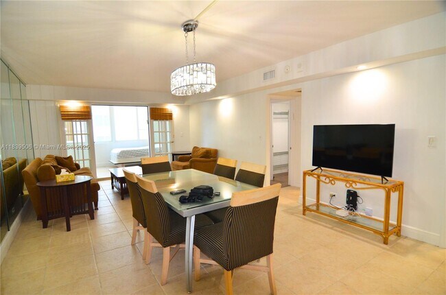 Building Photo - 5005 Collins Ave