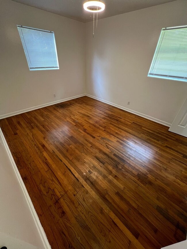 Building Photo - Updated 3BR | Solar Panels + Fenced Yard