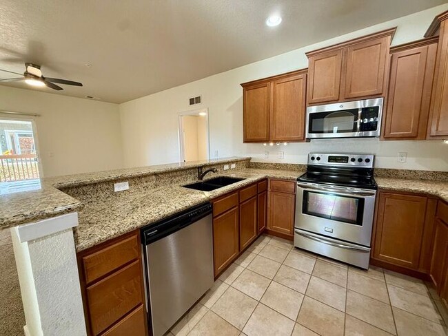 Building Photo - Fantastic 2 Bedroom, 2 Bath Ground Level Condo With Detached Garage in Loveland, Colorado