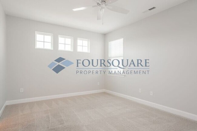 Building Photo - Spacious  End-Unit Townhome | Rear Deck & 2-Car Garage  | Near Brier Creek