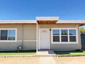 Building Photo - 2 bedroom with outside shed and carport.