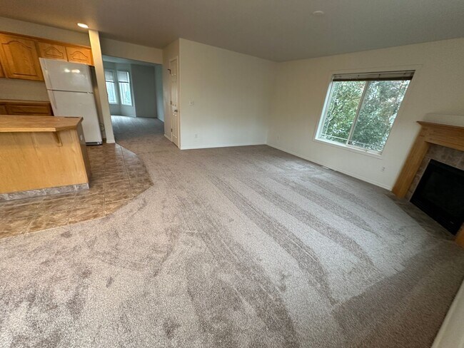 Building Photo - MOVE IN SPECIAL! Spacious 2 bed/2.5 bath with bonus room townhome off Road 68