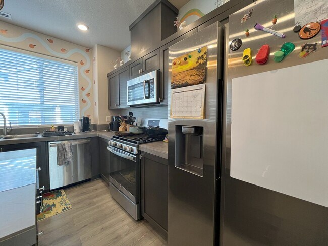 Building Photo - Your Modern Retreat with Open Living Space...