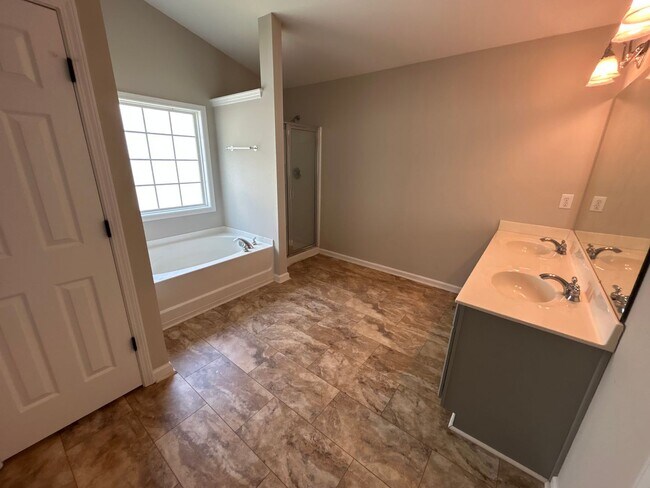 Building Photo - 4 Bedroom | 3 Bathroom Apex Home with Fenc...