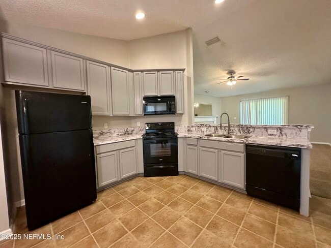 Building Photo - 6764 Gentle Oaks Dr