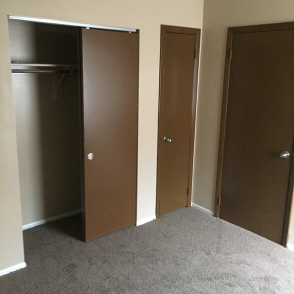 Bedroom. Freshly painted, newer carpet, double closet, & linen closet. - 2418 S San Gully Rd