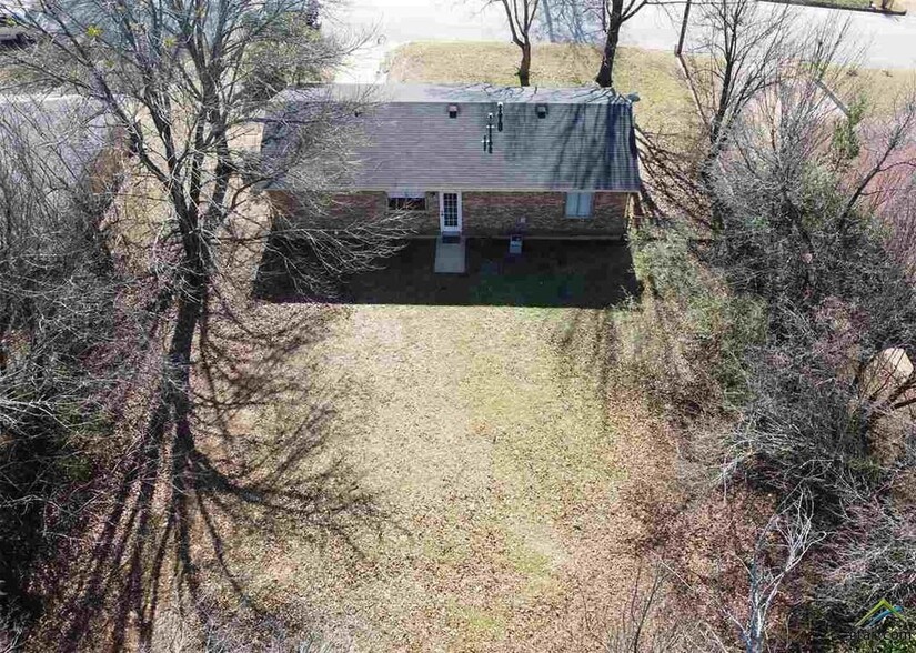 Huge back yard. - 1511 Milam Dr
