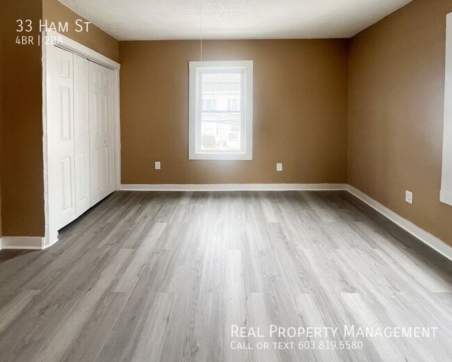 Building Photo - Spacious 4-Bedroom Apartment with Modern U...