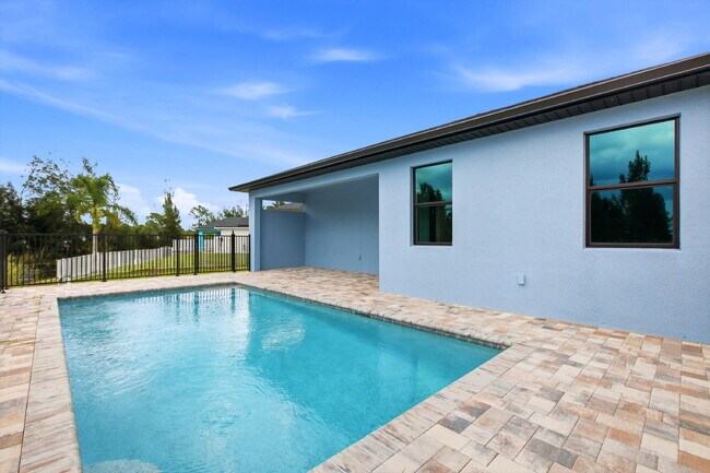 Building Photo - Brand New Canal-Front Pool Home for Rent, 3/2/2, NE Cape Coral. The Builder Didn't Cut Corners, S...